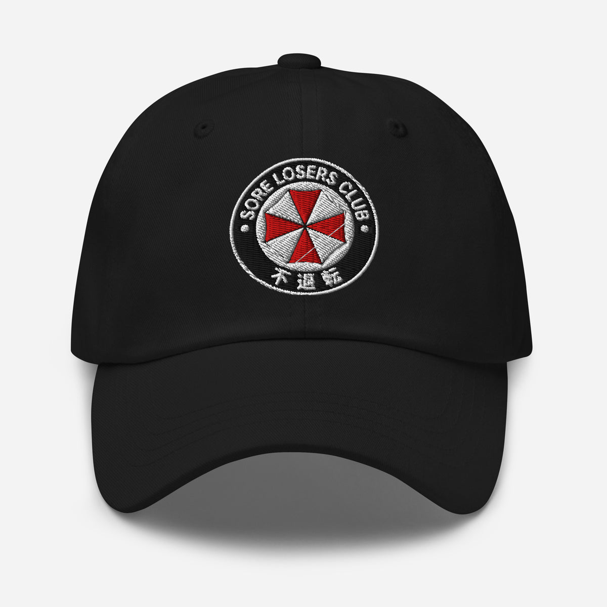 Black classic dad hat, front view, with an embroidered Sore Losers Club biotech emblem on the crown.