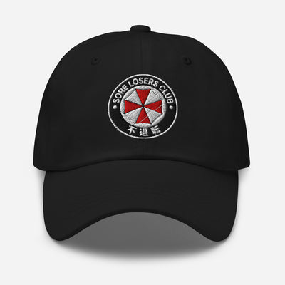 Black classic dad hat, front view, with an embroidered Sore Losers Club biotech emblem on the crown.