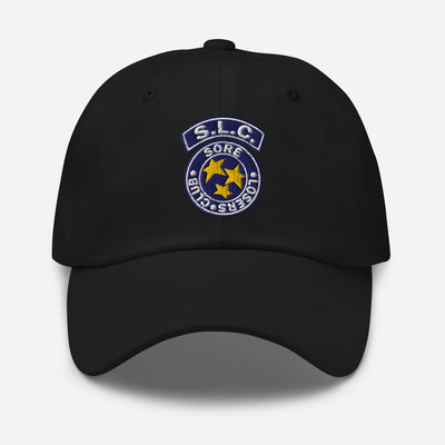 Black classic dad hat, front view, with the embroidered S.L.C. star badge on the crown.